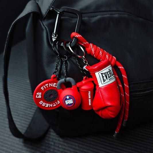 Lindo llavero de accesorio de gimnasio miniatura