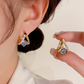 🔥Nuevo Llegado 2026 y Oferta Caliente🔥 Aretes colgantes (dangle) de aro en forma de V y corazón, elegantes