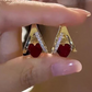 🔥Nuevo Llegado 2026 y Oferta Caliente🔥 Aretes colgantes (dangle) de aro en forma de V y corazón, elegantes