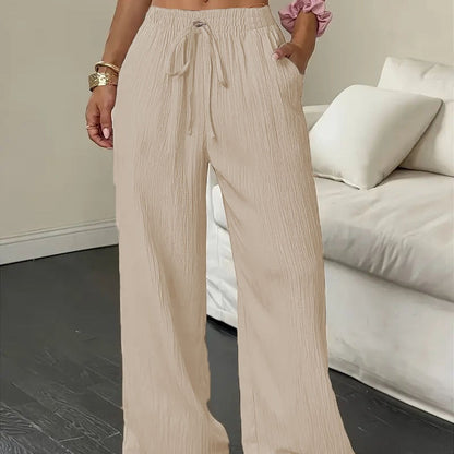 Pantalones de pierna ancha de color sólido con arrugas