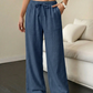 Pantalones de pierna ancha de color sólido con arrugas