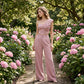 Elegante de un hombro floral superior y pantalones de piernas anchas conjunto