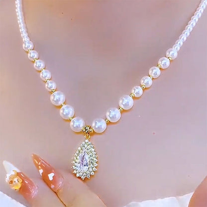 💟 ¡OFERTA LIMITADA 50% OFF! 💥 Collar de Perlas Estilo Vintage para Mujer – Gargantilla con Colgante de Lágrima, Perlas Luminosas, Tono Dorado ✨